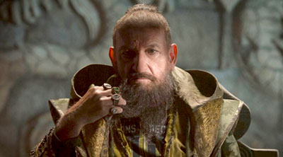 Ben Kingsley as the Mandarin in 'Iron Man 3' (SOURCE /></noscript> Marvel Studios)”/><figcaption>The Mandarin (Ben Kingsley) schemes away in <em>Iron Man 3</em>. (SOURCE: Marvel Studios.)</figcaption></figure></div>



<h4>It’s a Party and We’re All Invited</h4>



<p>As a director, Shane Black – like Favreau – has a knack for working with actors. Moreover, Black has a genius in writing dialogue and establishing action. (Talents he honed as screenwriter of the <em>Lethal Weapon</em> film series.) Tony’s character, just like Downey, suffers from an addictive personality, something all <em>Iron Man</em> flicks have exploited effectively. Interacting with foreign entities, who don’t need technological prostheses for their superhuman abilities, has affected Stark more than he’s willing to admit. Downey plays that inner conflict convincingly. Tony and a boy named Harley, played by veteran kid thespian Ty Simpkins (<em>Insidious</em>), get the best lines. Regardless, every character in the movie has plenty to say.</p>



<p>All the actors here got a kick out of their roles for sure, especially the bad guys. Ben Kingsley (<em>Gandhi</em>) is a respected actor who never backs away from a challenge, however controversial or ridiculous it may seem. It’s a trait Black fully takes advantage of for Kingsley’s Mandarin, one of the most infamous enemies in Stark’s comic book rogue gallery. Guy Pearce (L.A. Confidential), meanwhile, is so used to being a baddie that it fits him like a glove. Only their goons seem to be enjoying themselves more than the rest of the cast, especially Stephanie Szostak of <em>Dinner for Schmucks</em> fame and James Badge Dale, who had a short but memorable role in <em>Flight</em>.</p>



<div class=